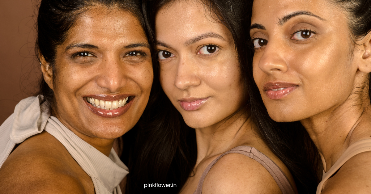 Indian woman applying skincare cream on face in natural light – skincare routine for Indian skin